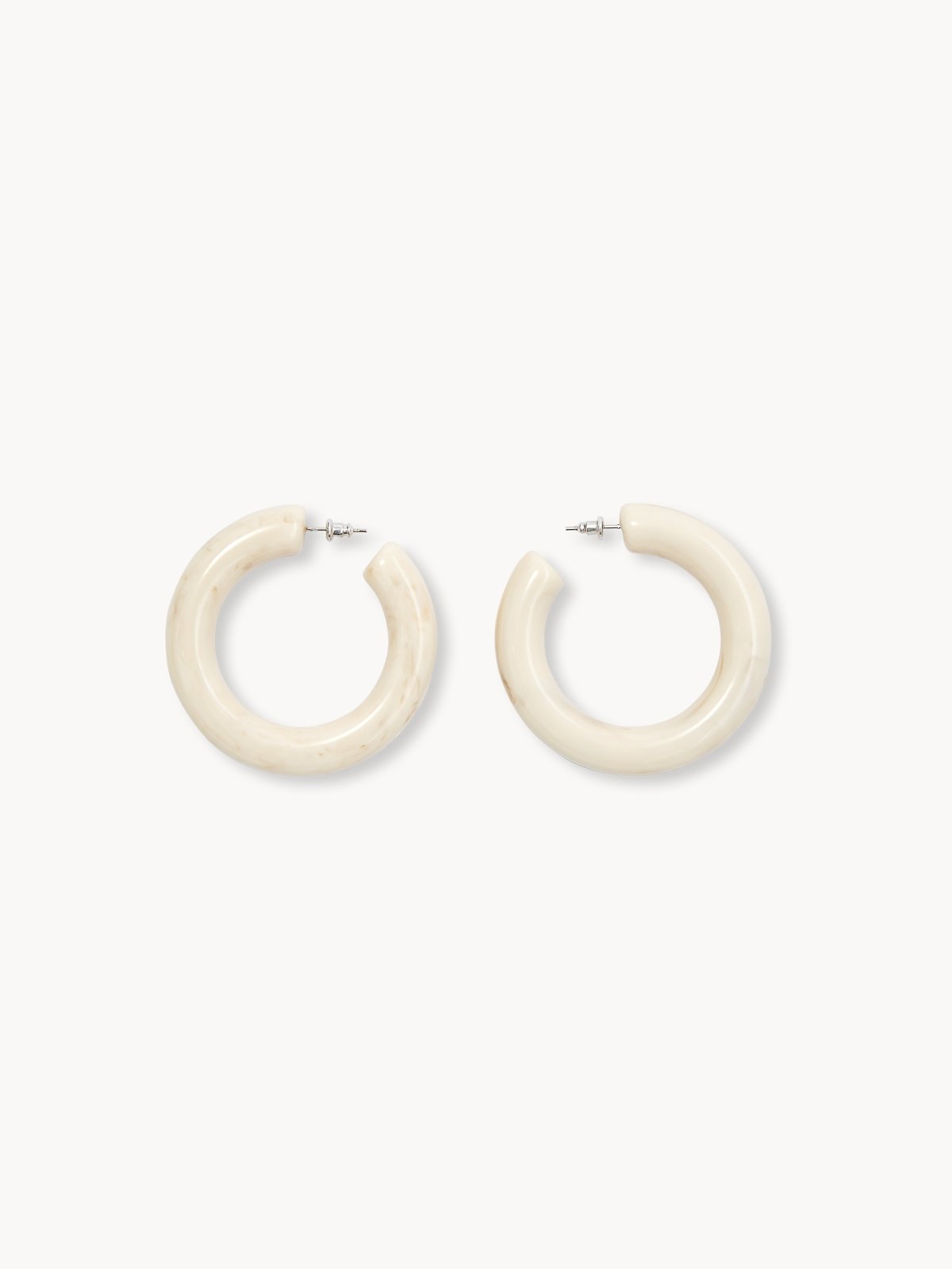 White circle top earrings