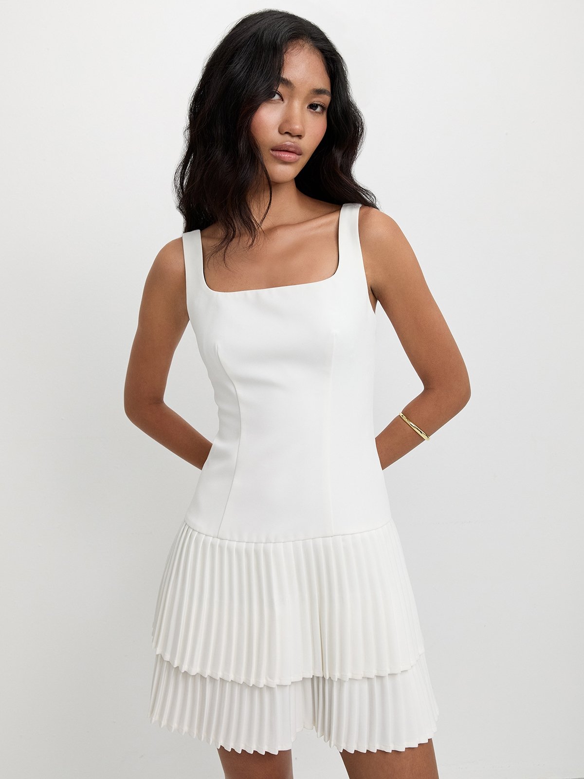 sleeveless pleated mini dress Haddy Pleated Mini Dress in Navy