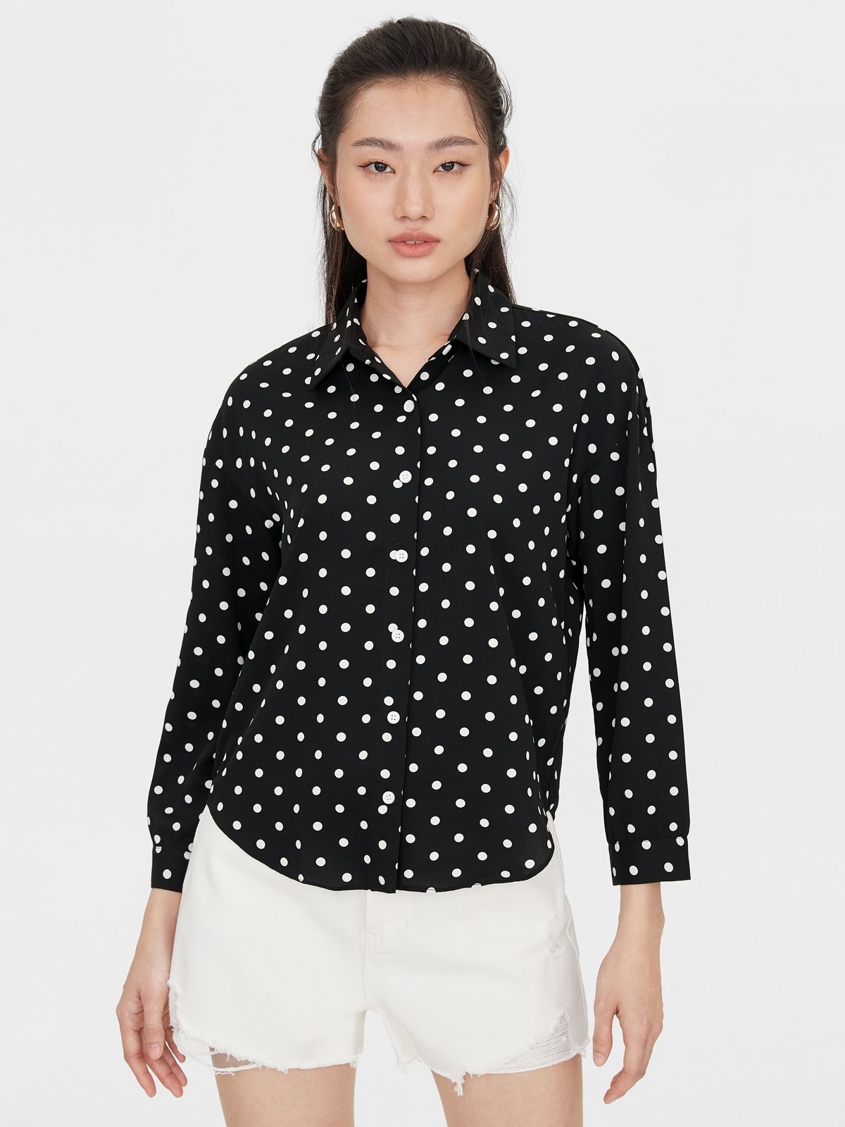 black polka dot top