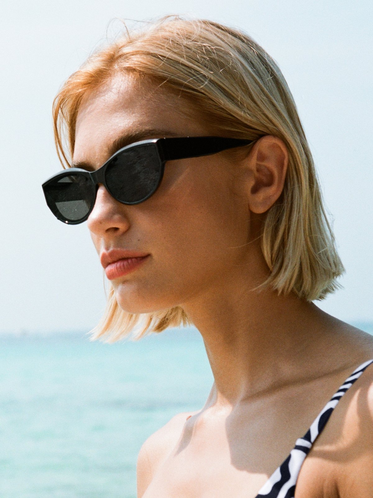 Black round shop cat eye sunglasses