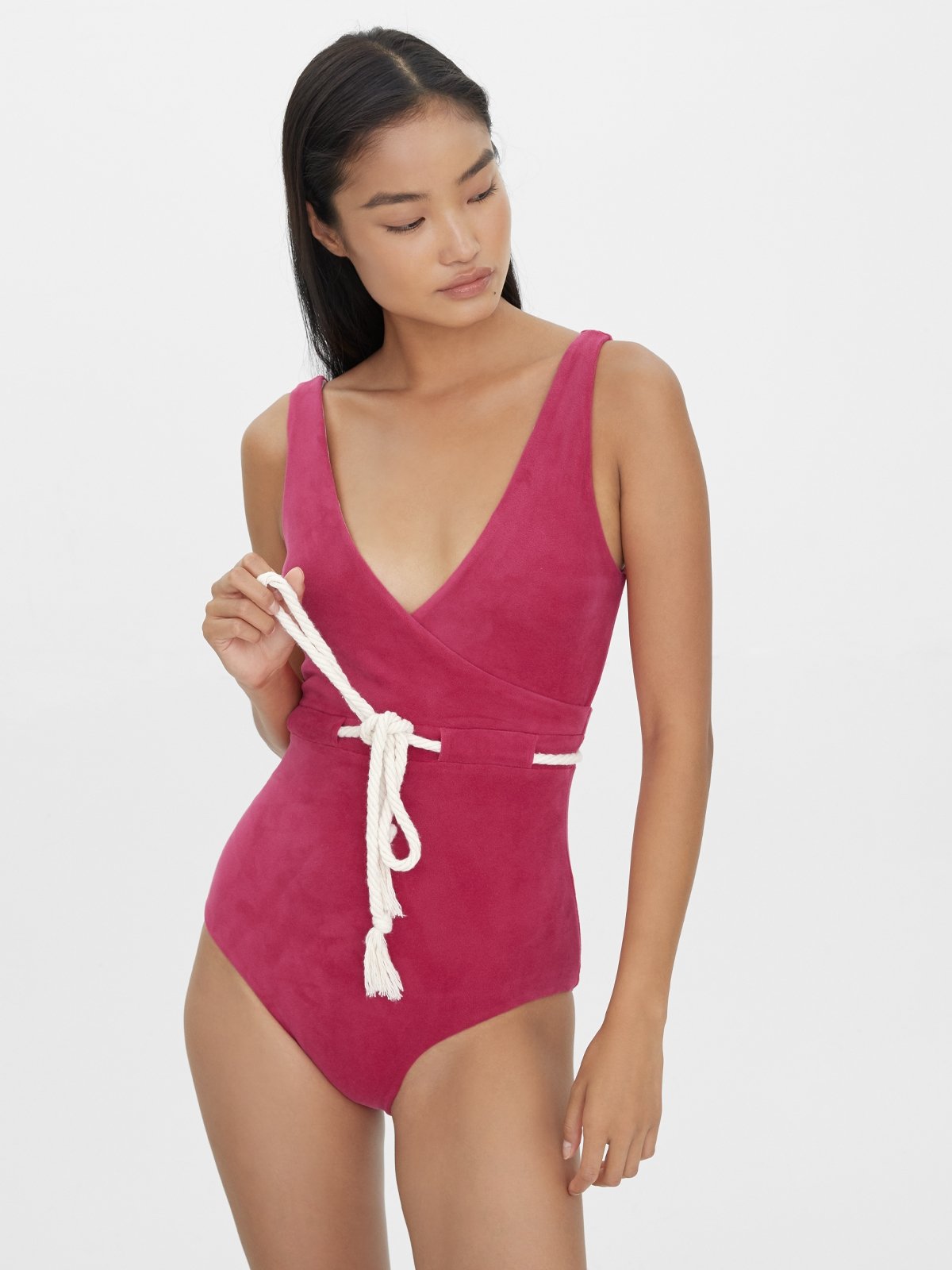 Pink belted swimsuit top