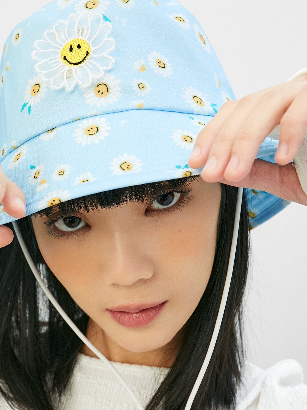 Blue floral bucket hat sales