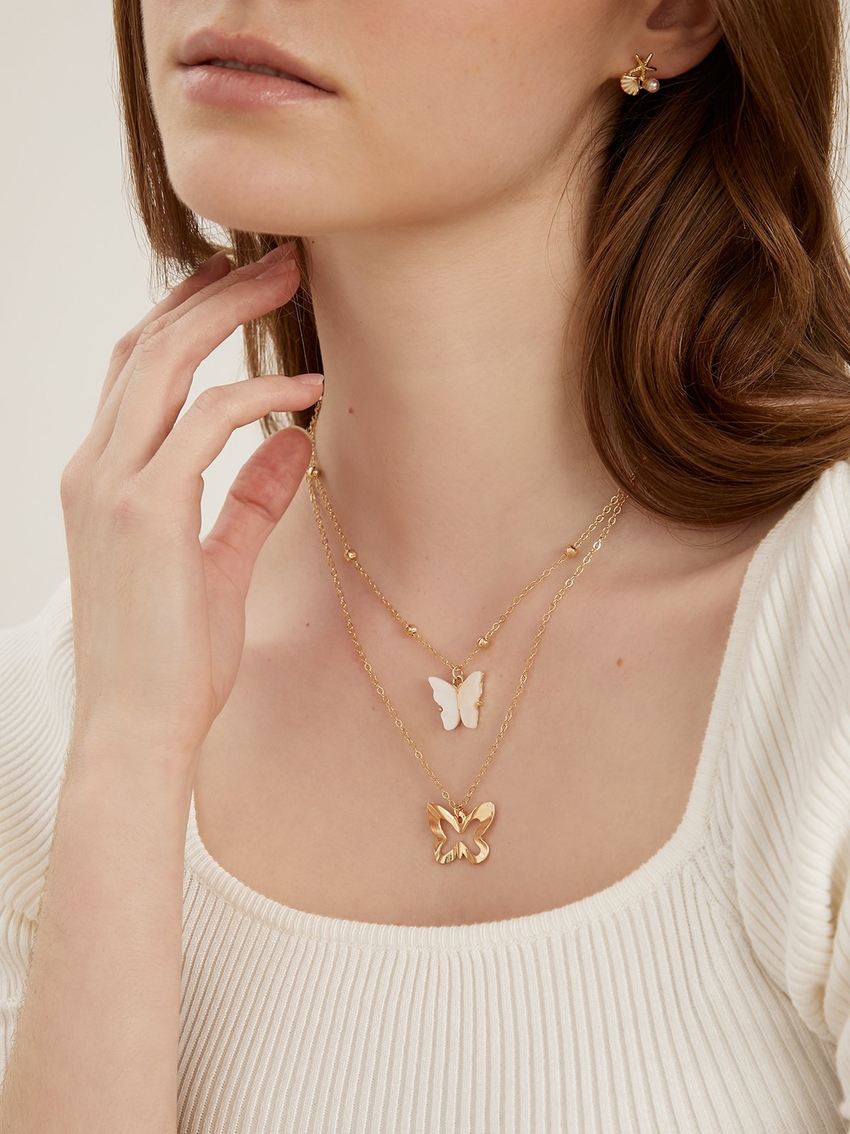 Layered butterfly best sale necklace
