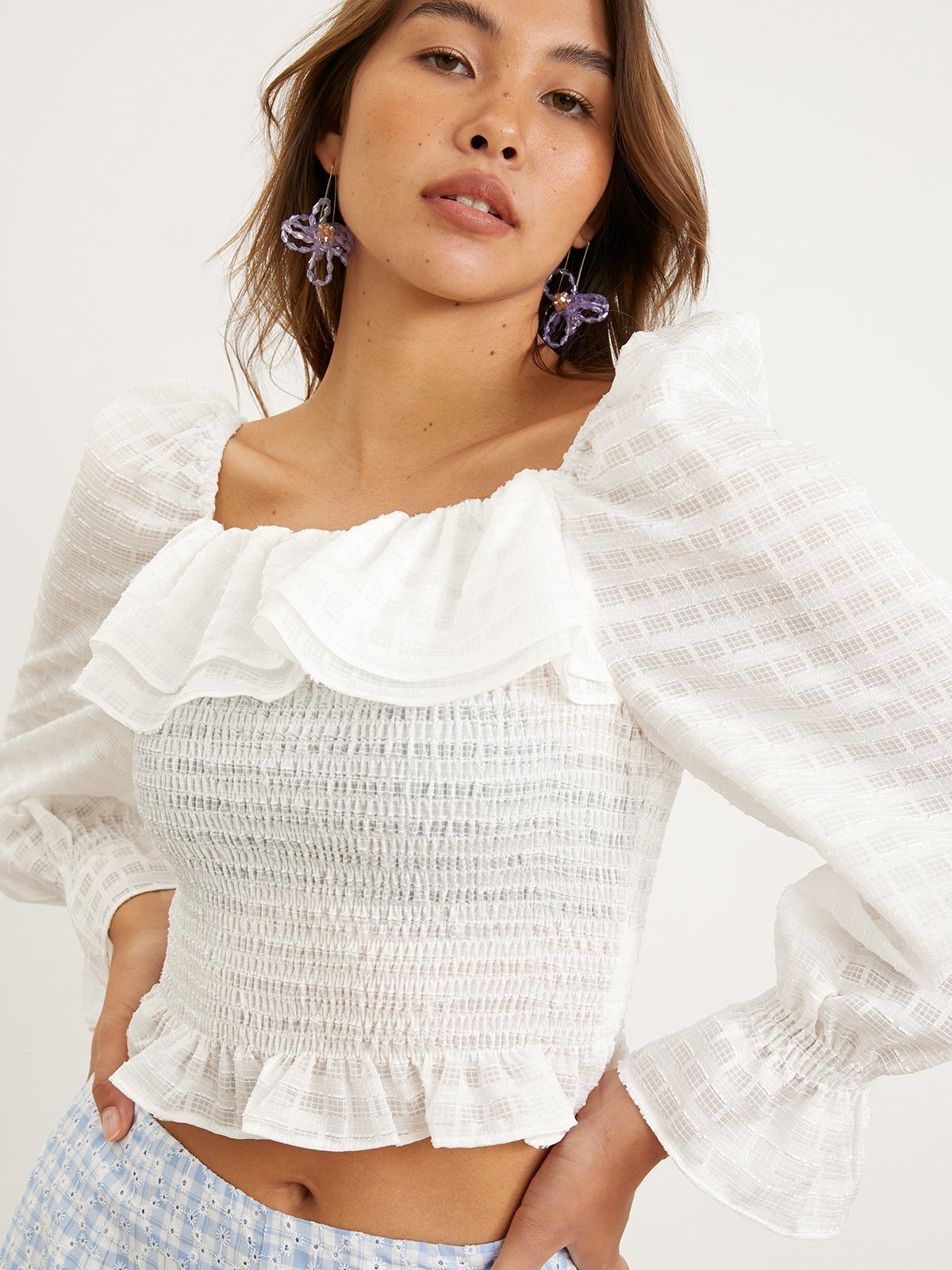 White ruffle crop top sales long sleeve