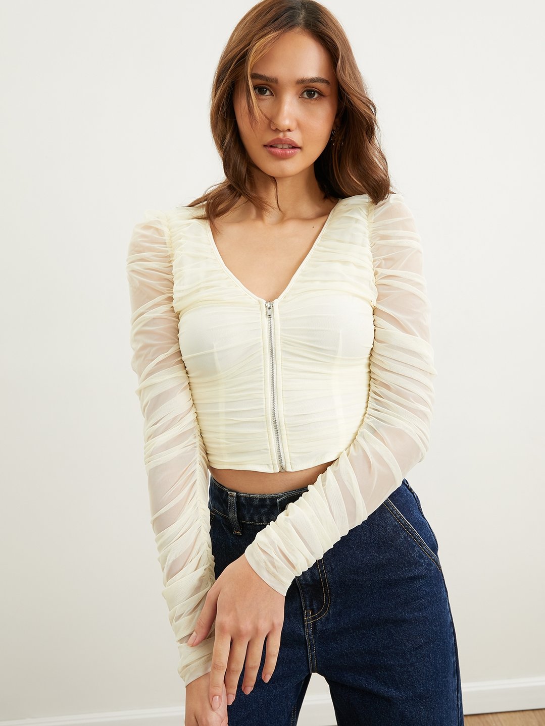 Long Sleeve Ruched Crop Top in Cream