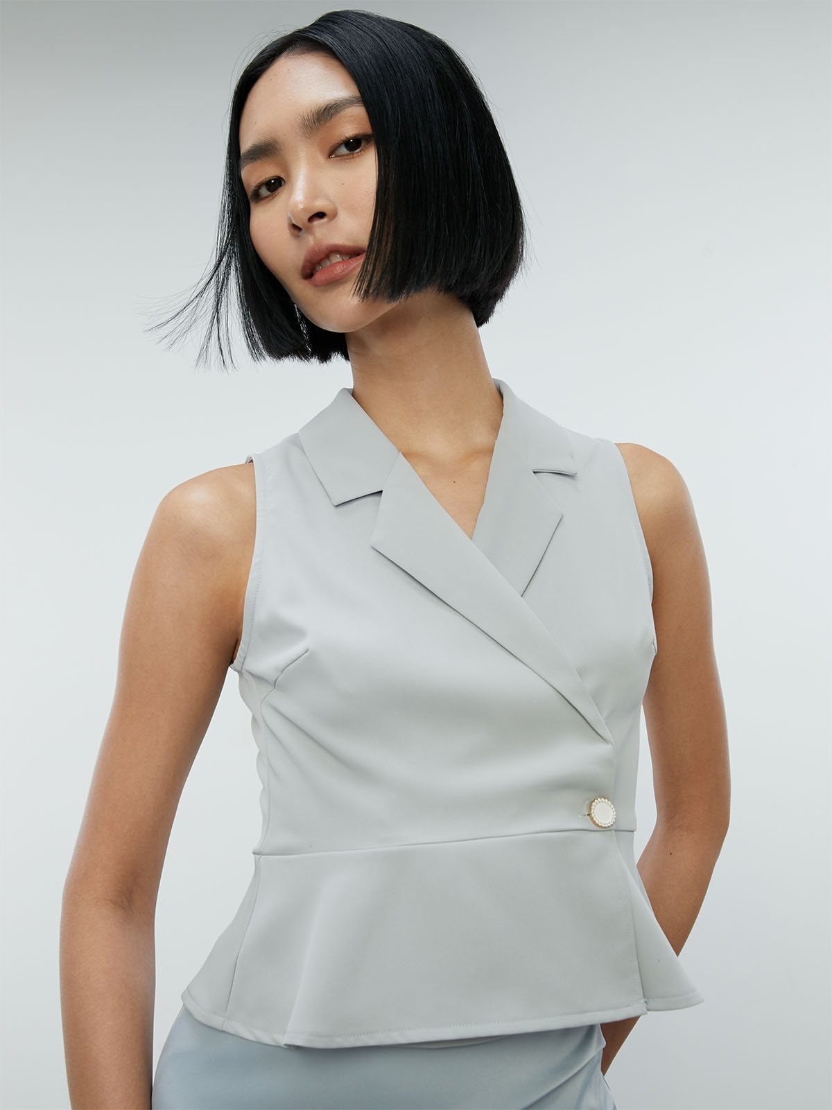 Gracious Sleeveless Open Back Peplum Top Yellow