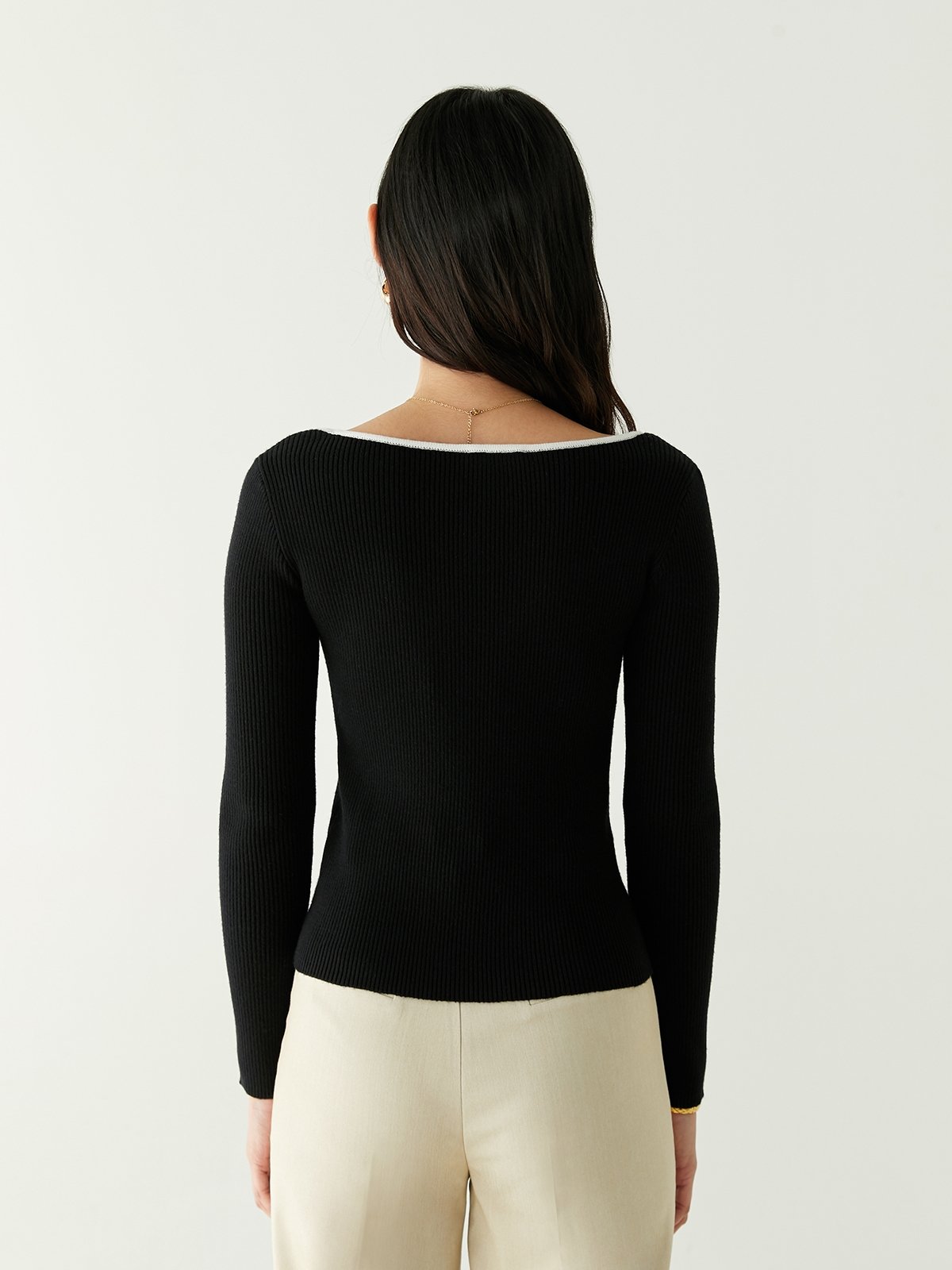 White top on sale with black sleeves