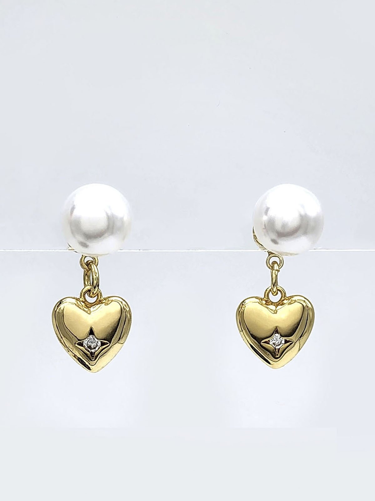Heart and pearl earrings store