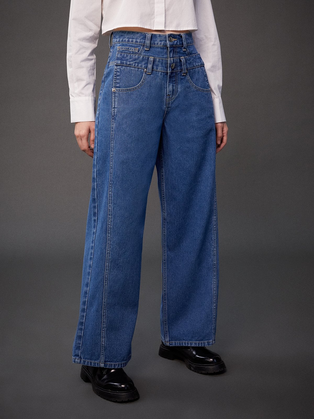 BLUE STRIPE Metal belt flared pants