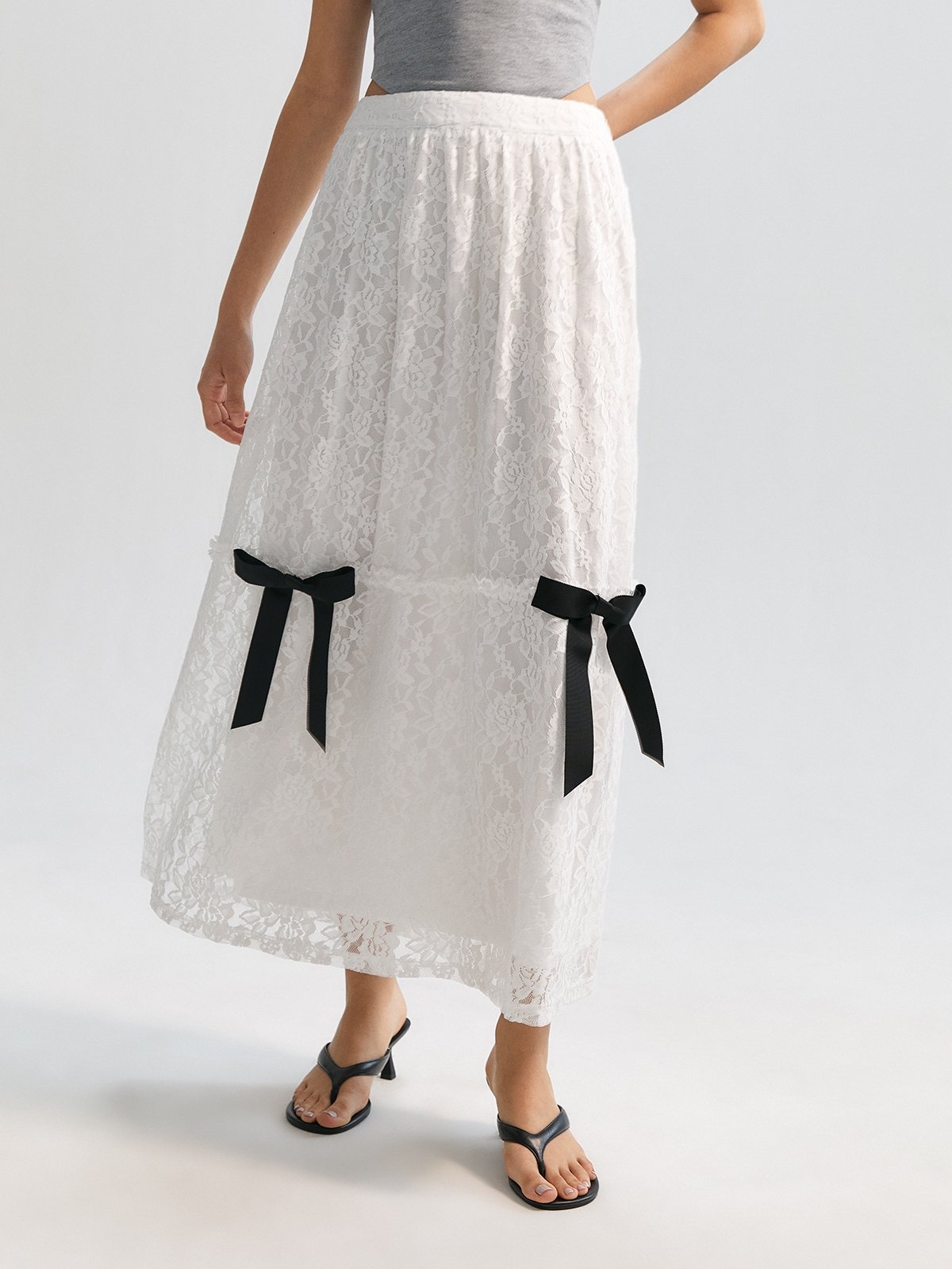 Lace Flowy Maxi Skirt with Feminine Bow Detail White Pomelo Fashion